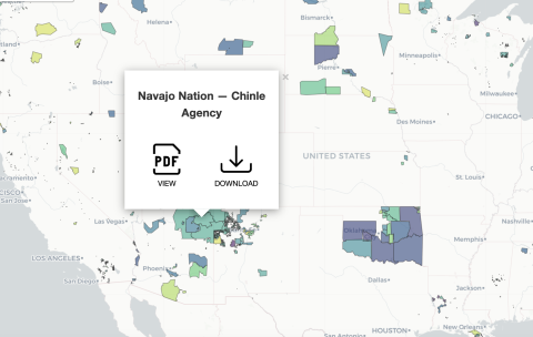 Map window zoomed to the U.S. states approximately southwest of the Great Lakes. Lands of Tribal nations are shaded in varying colors. A white pop-up box above one shaded area reads "Navajo Nation - Chinle Agency" and provides the user the option to view a PDF or download content.